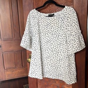 Gently worn large Banana Republic blouse. Small makeup stain.